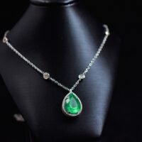 Enchanting White Gold Pear Shape Emerald & Diamond Necklace
